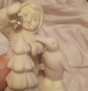 Charming White Penguin and Santa Figurine